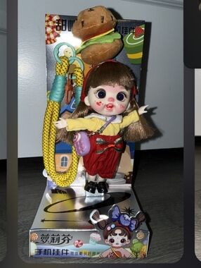 Cute Kids Doll with Red Outfit and Yellow Top